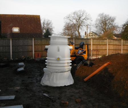 installation of mini pumping station to allow drains to be lowered enabling the house to sit lower on the plot