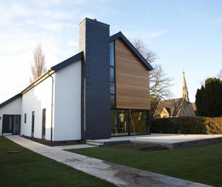 Finished property showing slate clad feature chimney stack