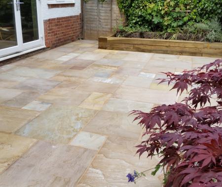 Design and build of sandstone patio at a semi detached property in Grimsby